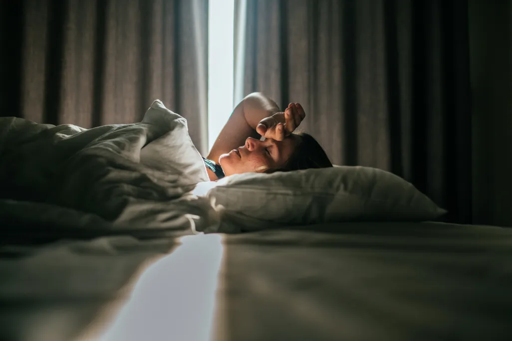 person in bed