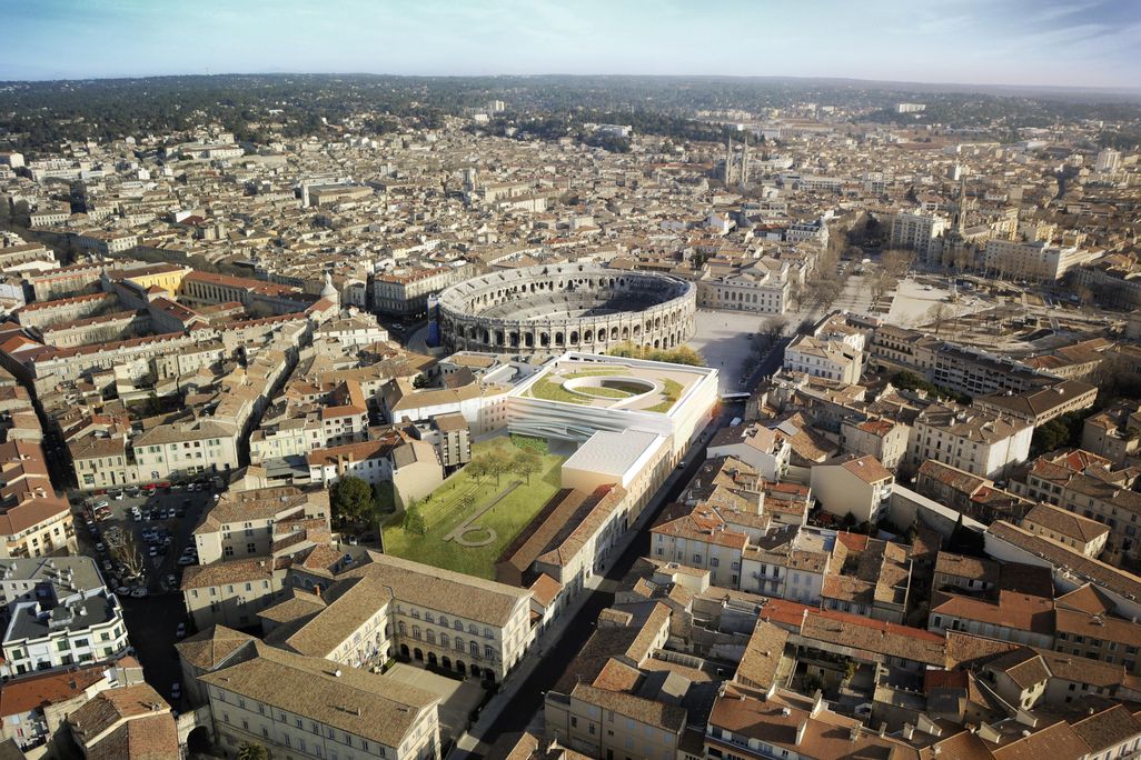 An aerial photograph shows the new museum’s proximity to the ancient arena.
