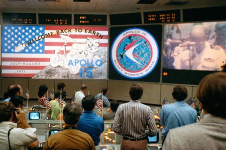 NASA flight controllers celebrate the return of Apollo 15 in 1971.