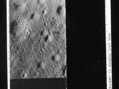 The last image taken by Ranger 7, less than two-tenths of a second before hitting the moon on July 31, 1964. The spacecraft was about 480 meters above the lunar surface when transmission began; impact came before the photo finished sending, so the right half is cut off. The resolution in this final image is about half a meter.