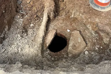 The opening to the cistern was discovered beneath Jefferson Drive, which runs alongside the Smithsonian Castle and other museums.