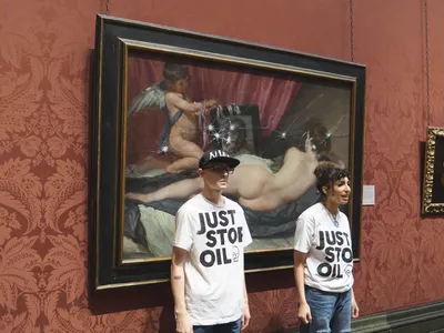 Two&nbsp;Just Stop Oil protesters after smashing the glass protecting&nbsp;Rokeby Venus at London&rsquo;s National Gallery&nbsp;