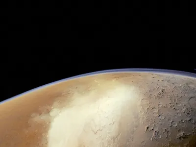 Mars (photographed here by the European Mars Express orbiter) has a thin atmosphere--useful for landers parachuting down to the surface, and the subject of interest for orbiters like the UAE's Hope spacecraft.