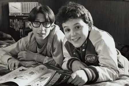 Fred Savage (right) and Josh Saviano (left) of "The Wonder Years" reunited at the American History Museum on December 2, 2014 to donate items, including the New York Jets jacket shown here in a publicity photo from around 1988.