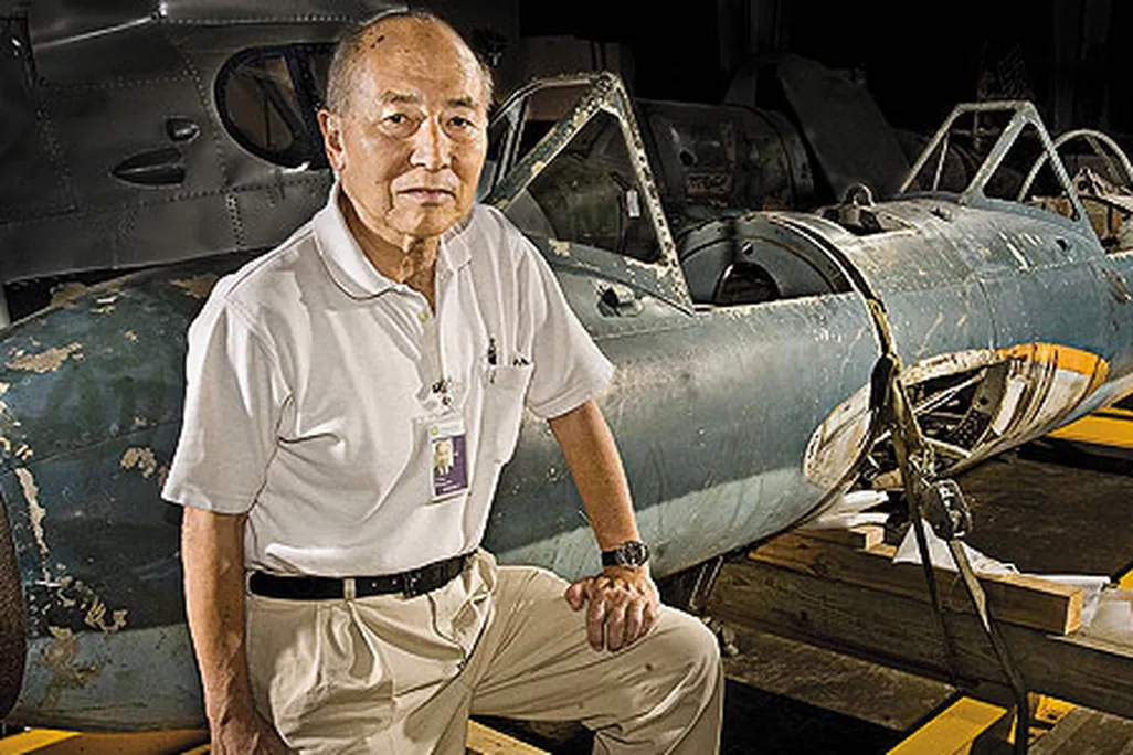 Museum volunteer Tom Momiyama with the last remaining Ohka K2 at the Museum’s restoration facility.