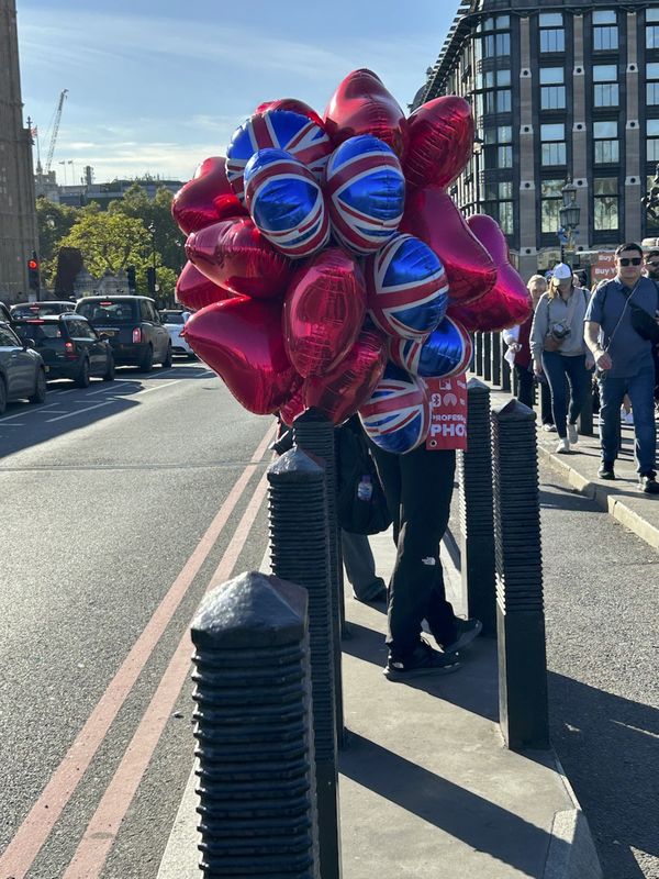 Balloon seller at work thumbnail