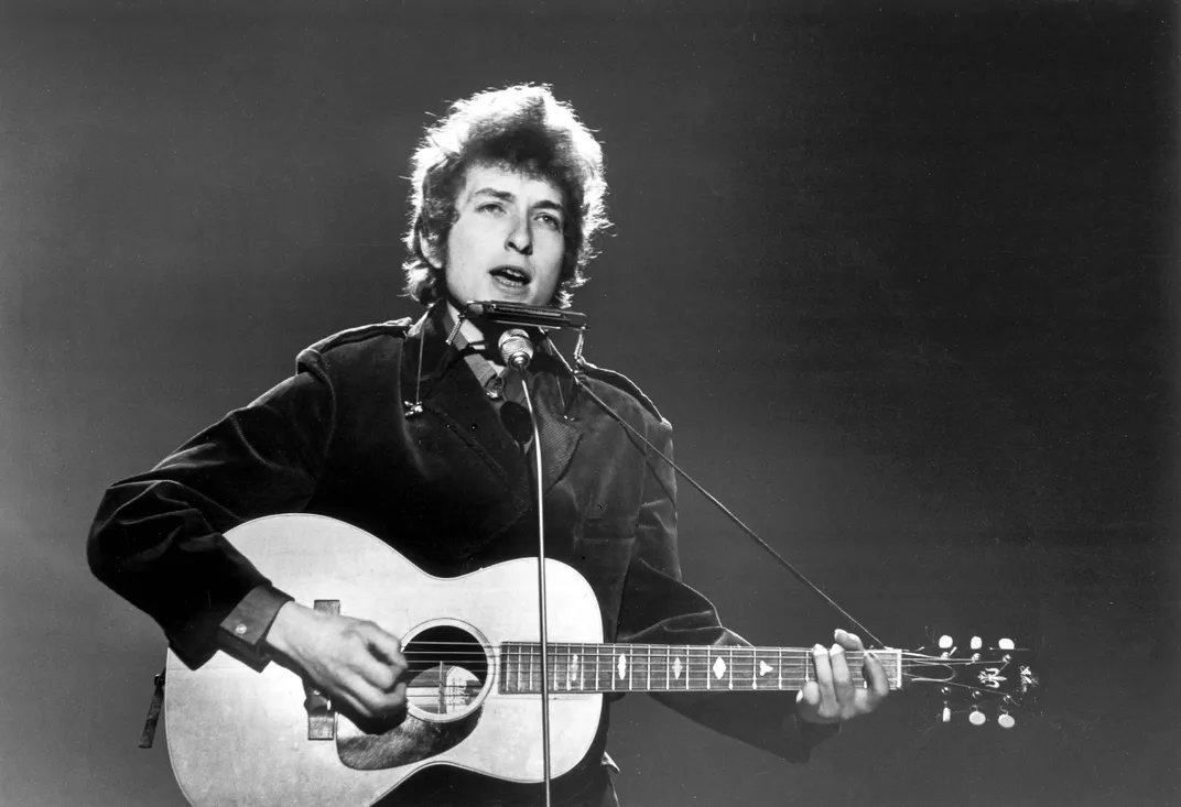 Dylan performing in London in June 1965