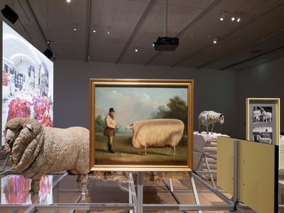 Replicas of sheep and paintings are part of the exhibition&#39;s &quot;exploded&quot; diorama layout.