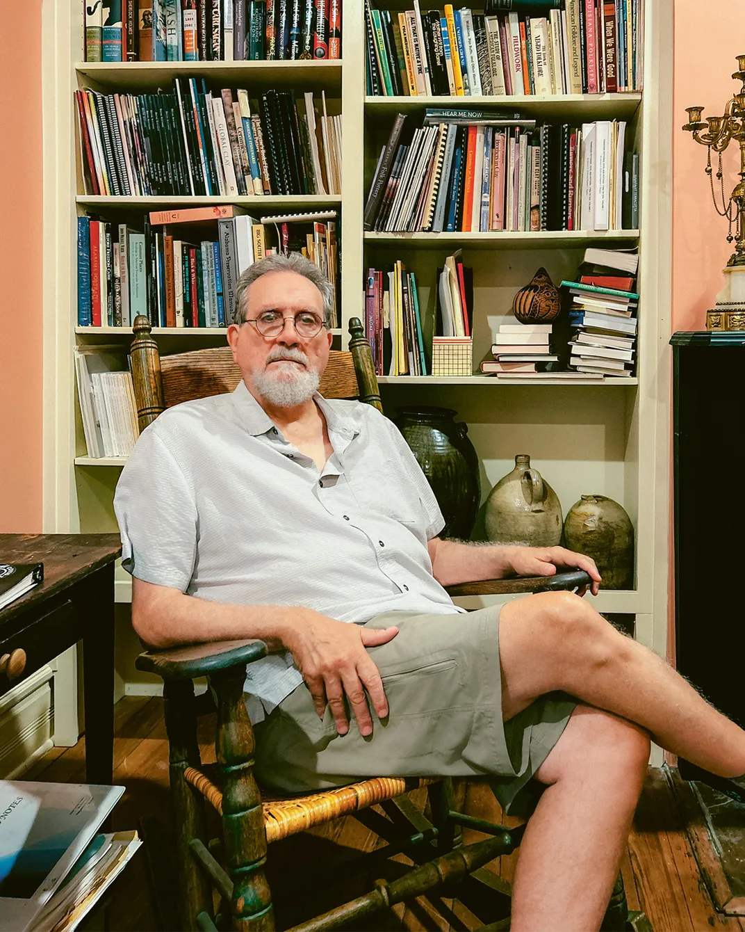 a man sitting in his home office