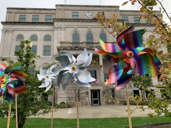 Pinwheels in front of courthouse thumbnail
