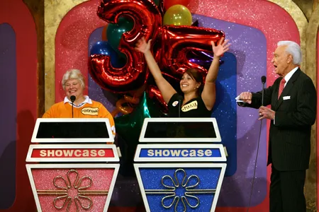 Host Bob Barker announces the showcase showdown at the taping of the 35th season premiere of "The Price Is Right" in 2006.