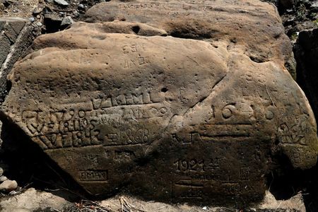 Engravings on a 'hunger stone' have been revealed in the Elbe River in the Czech Republic due to drought. 