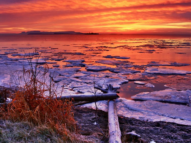 Sunrise over the Sleeping Giant in Thunder Bay Ontario as the ice