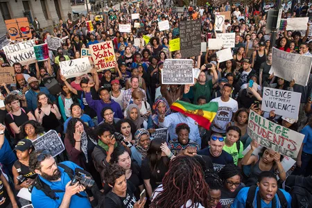 Protestors march in downtown Baltimore, Maryland, April 29, 2015. 