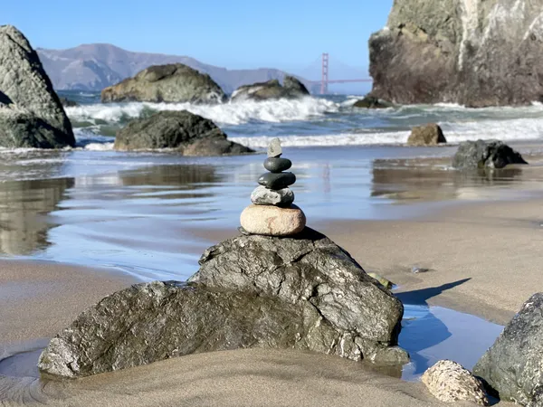 A cairn mimics one of the towers of the Golden Gate Bridge in San Francisco. thumbnail