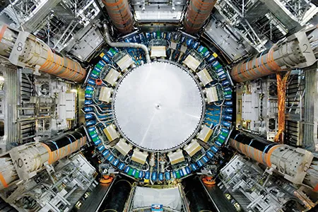 The ATLAS detector, one of two experiments to spot the elusive Higgs boson in particle smashups at CERN’s Large Hadron Collider, weighs as much as a hundred 747 jets and houses more than 1,800 miles of cable.