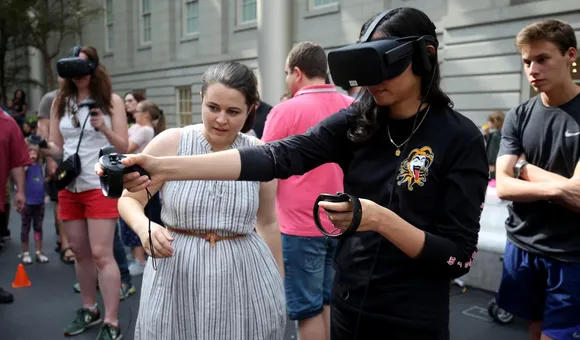Testing out Virtual Reality at SAAM Arcade 2018. Photo by Libby Weiler.