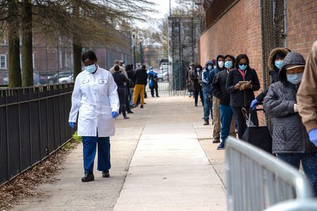 In April, people queued at a testing tent in East New York in Brooklyn. COVID-19 rates are highest among black New Yorkers in Kings County.