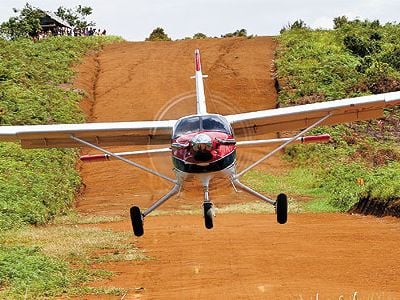 Bush flying has unique challenges. This Quest Kodiak gets a little extra thrust on takeoff from the slope of a dirt airstrip carved out of a hill in East Kalimantan, Indonesia.