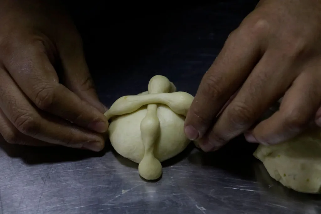preparing pan de muerto