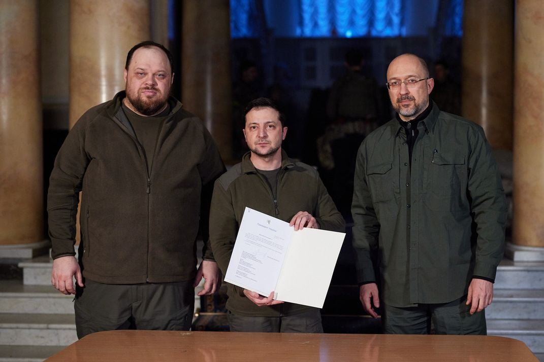 L to R: Ukrainian Parliament chairman Ruslan Stefanchuk, Ukrainian President Volodymyr Zelenskyy and Ukrainian Prime Minister Denys Shmyhal after signing Ukraine's application for membership to the European Union on February 28, 2022