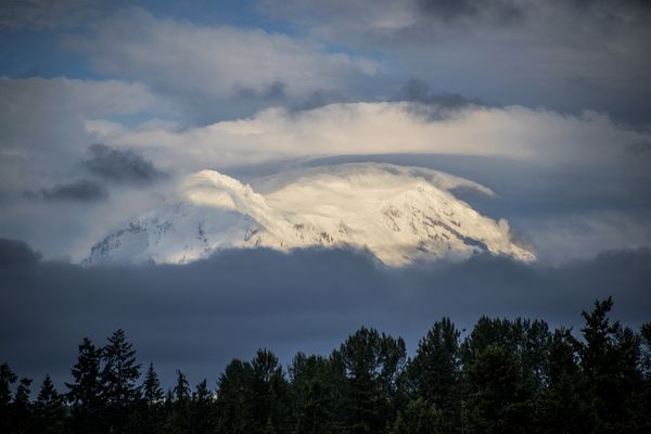 Mount Rainier surrounded by clouds thumbnail