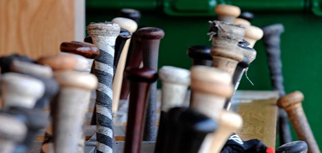 Baseball bats in dugout