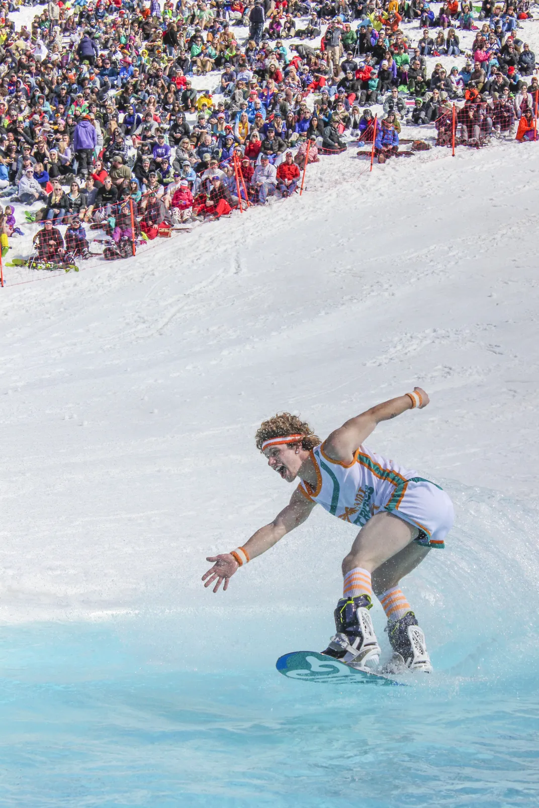 snowboarder pond skimming at Big Sky Resort