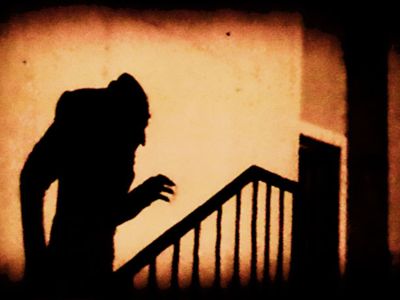 A shadowy scene from F. W. Murnau's Nosferatu (1922). 