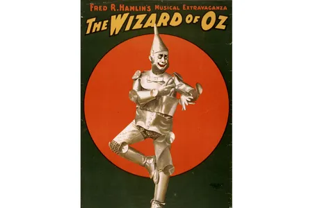 Baum produced a stage version of his children's book two years after it came out. This work was aimed primarily for adults, and was the first time the Tin Woodman was referred to as the Tin Man.