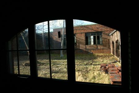 A corridor leading to the infectious disease ward at Ellis Island's defunct hospital. 