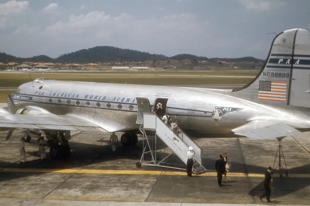 A vintage photo of a large commercial plane