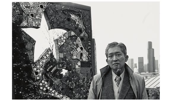 Photograph of Val Laigo next to his mosaic in Dr. Jose Rizal Park, Seattle, Washington (detail), between 1988 and 1989 / unidentified photographer. Val Laigo papers, 1954-1998. Archives of American Art, Smithsonian Institution.