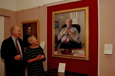 Secretary Adams and his wife Ruth contemplate his official portrait, which to this day resides at the Smithsonian Institution "Castle" Building.