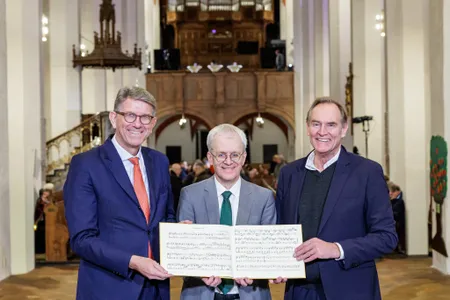 Wolfram Weimer, the German culture minister; Peter Wollny, director of the Bach Archive in Leipzig; and Burkhard Jung,&nbsp;Leipzig&#39;s mayor&nbsp;pictured with the two compositions