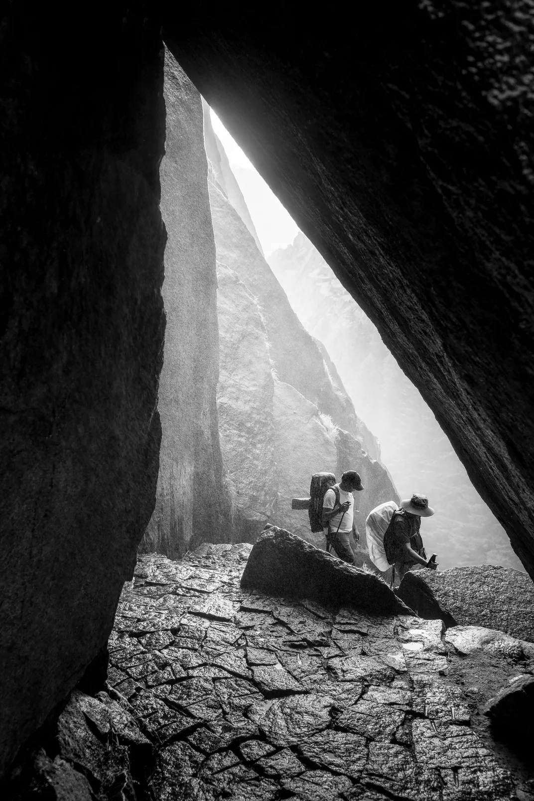 Hikers descend the Mist Trail