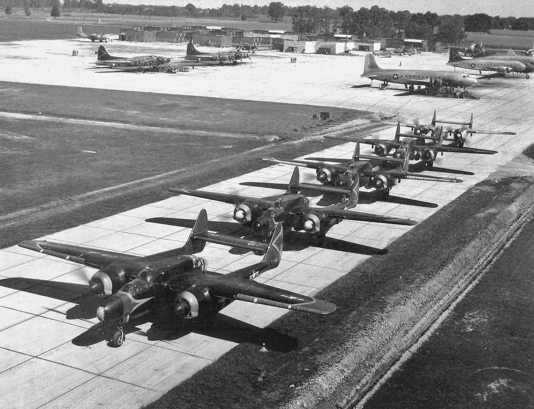 A squadron of Black Widows prepares for takeoff.