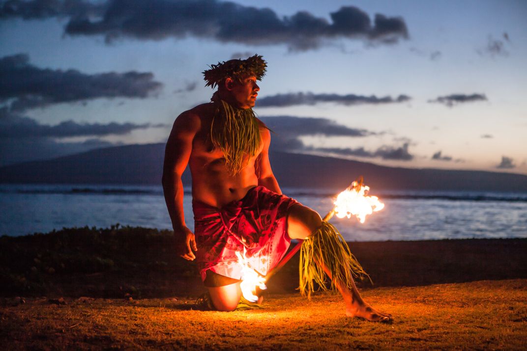 Fire dancer at a luau