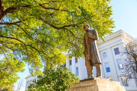 Statue of James Marion Sims in front of the Alabama State Capitol.
