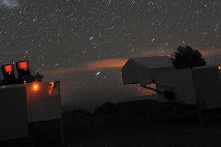 HATSouth telescopes search for dim planets orbiting the stars in Chile’s Atacama desert sky.