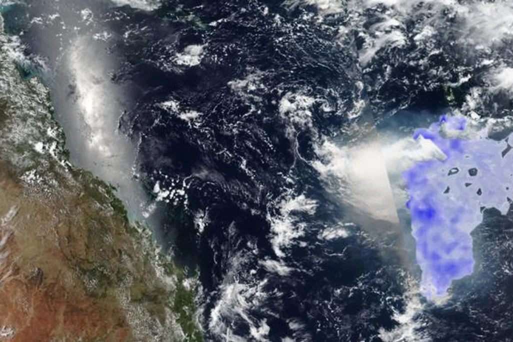 A satellite image with a blue cloud on the right