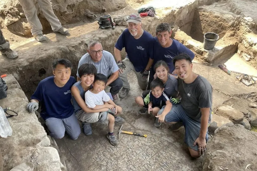 Archaeologists posing