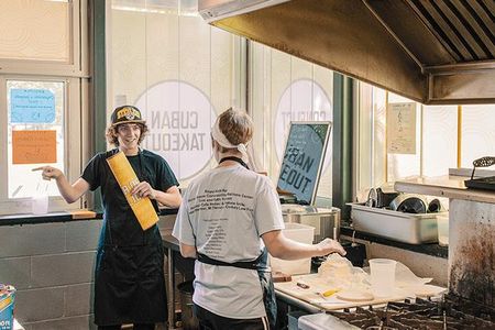 Staffers are trained to both prepare food and discuss political issues with customers. 