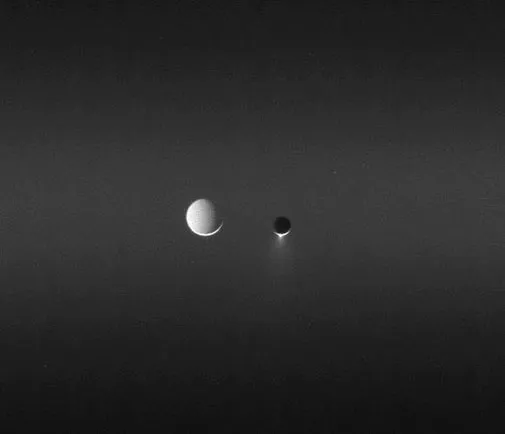 Two of Saturn's satellites, side by side.