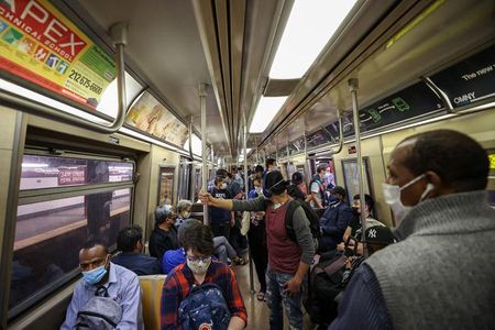 Passengers ride the New York City subway on May 24, 2021.