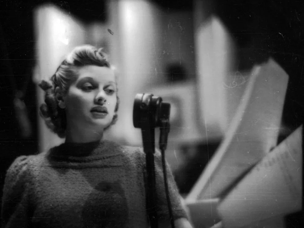 American actress Lucille Ball (1911 - 1989) appears on radio programme "The Phil Baker Show" in 1938