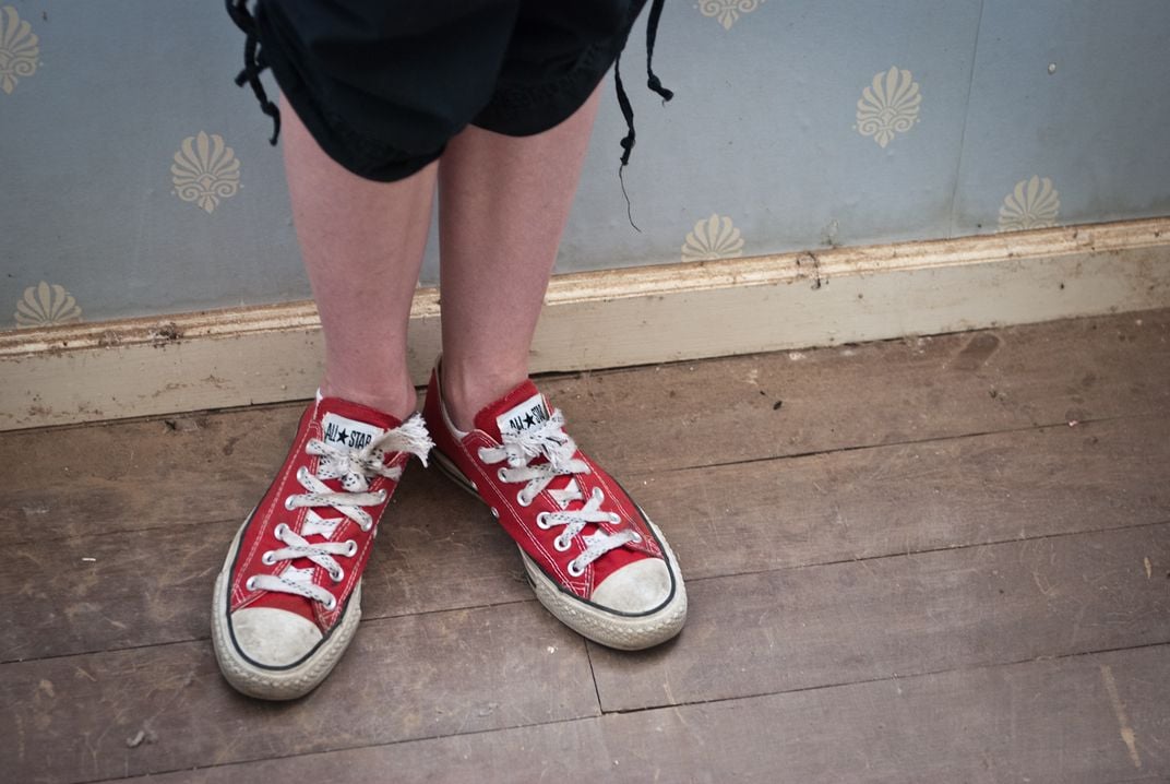 Close-up shot of red Converse shoes. | Smithsonian Photo | Smithsonian Magazine