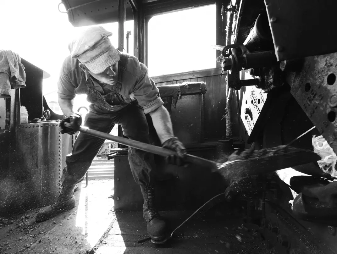 13b - The Wilmington & Western Railroad in Delaware relies on volunteers to run all of its excursion trains. That work includes the task of building a fire for the steam engine.