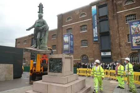 Workers removed a statue of enslaver Robert Milligan in 2020. Eventually, the new monument will be located nearby.
