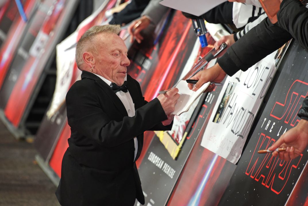 Jimmy Vee signs autographs